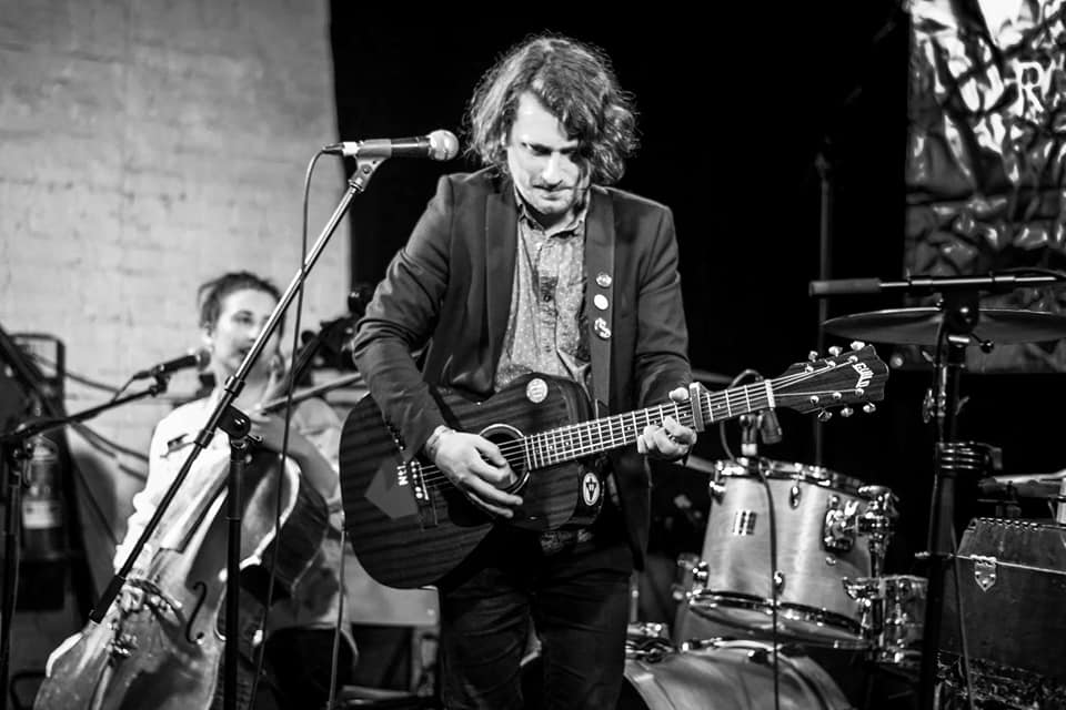 On stage, black and white